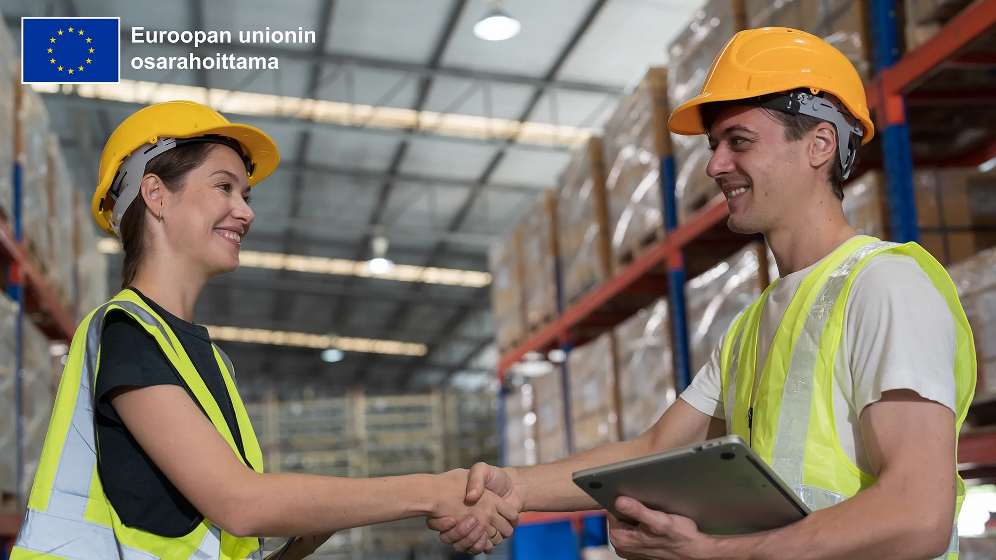 kuvassa työntekijät kättelevät